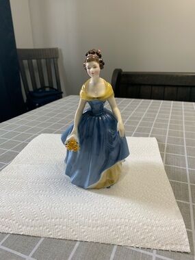 Royal Doulton Lady Figurine in Blue and Yellow Dress